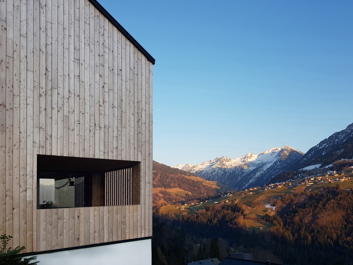 House nestled on a steep slope. Breathtaking views of the Austrian landscape