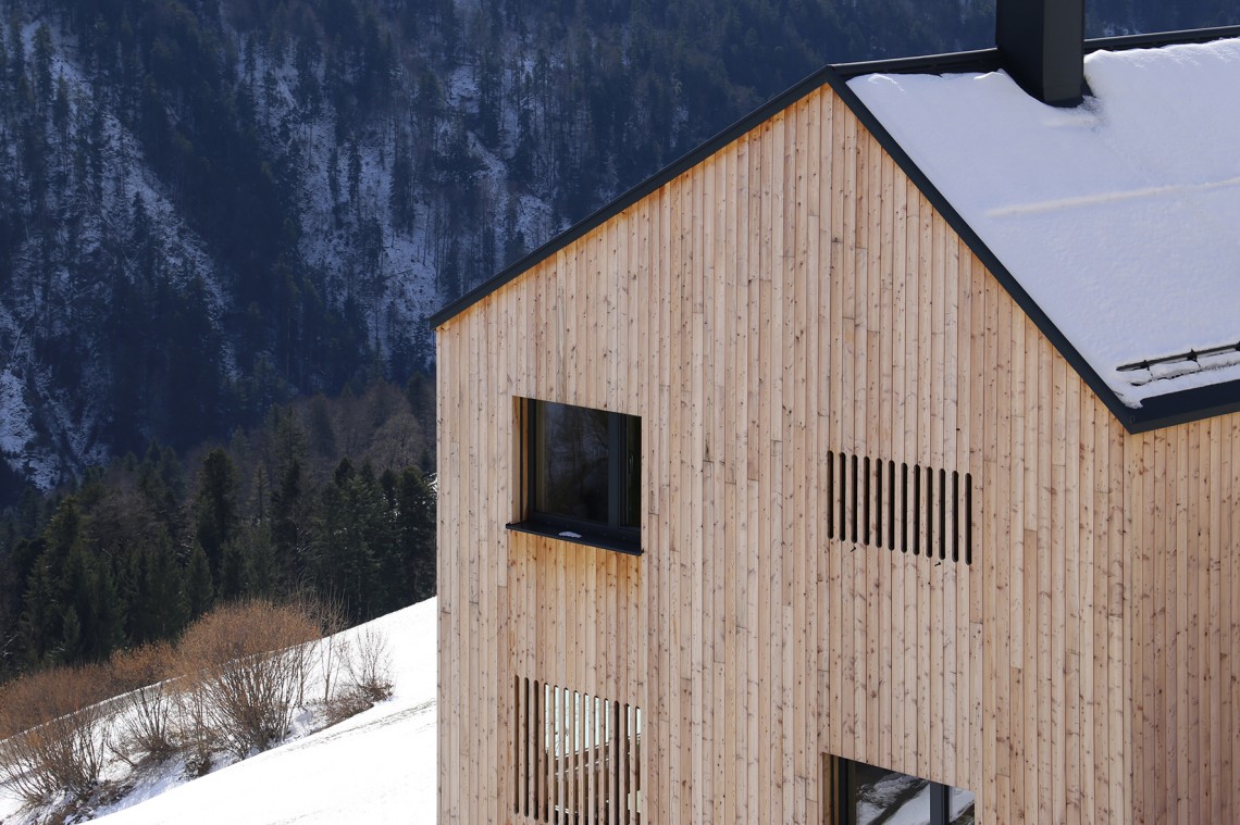 House nestled on a steep slope. Breathtaking views of the Austrian landscape