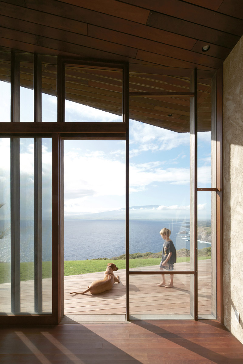 Home on a cliff in Hawaii. A common roof encloses several