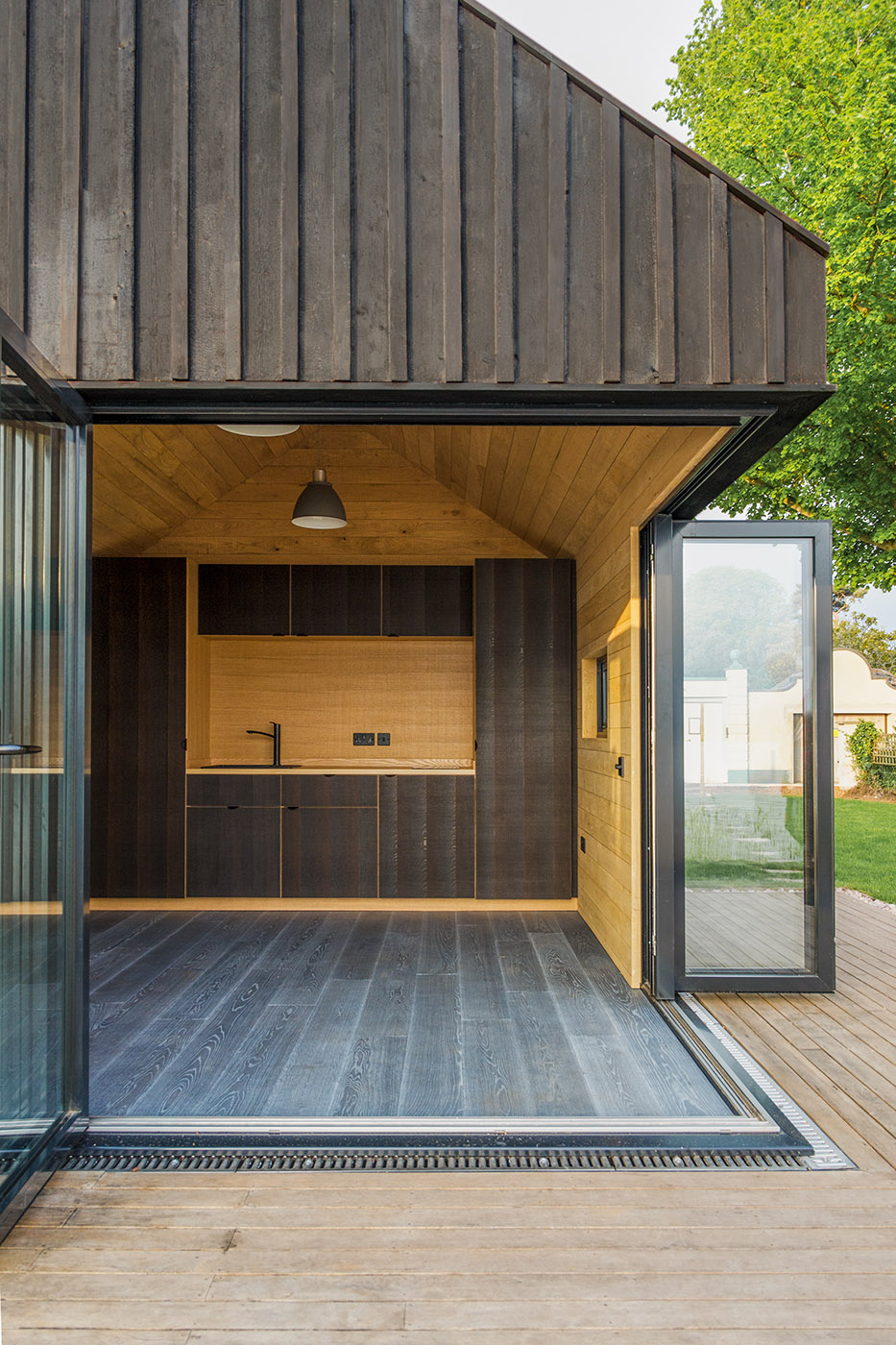 Monolithic shape for a wooden cabin. Searching for elegance in simplicity