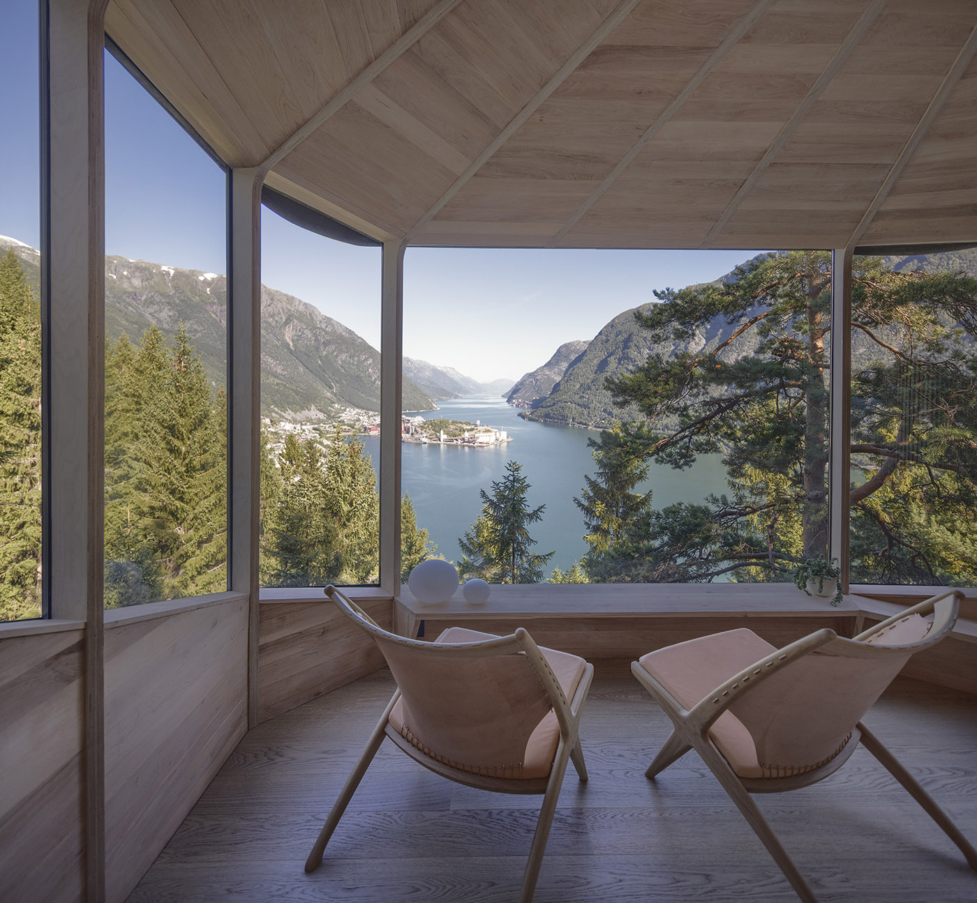 Two tree houses in Woodnest, on the steep woodland hills around Hardangerfjord