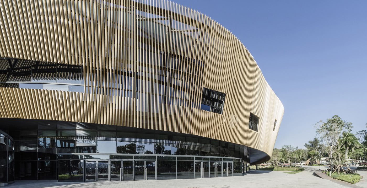 pavilion-centre-culture-wood-circular-education-competition-landscape-sky-exposure-lighting-ramp-slats-lamella-circle-lighting-structure-exterior-interior