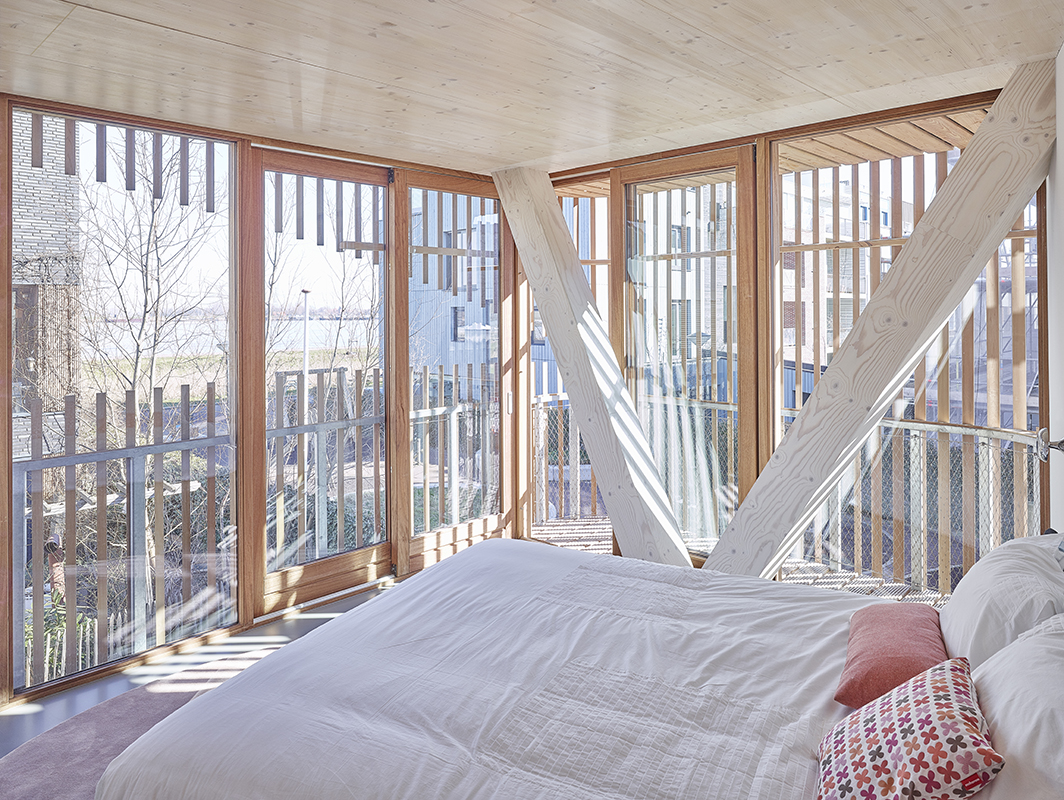 design-building-residence-complex-slats-wood-organic-innovation-construction-nature-sun-movement