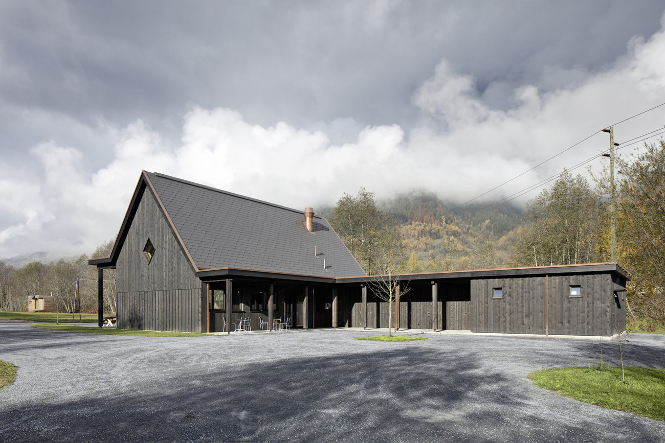 Traditional wooden building surrounded by Swiss nature