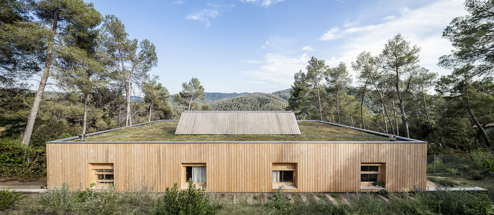 Wooden building overlooking the landscape
