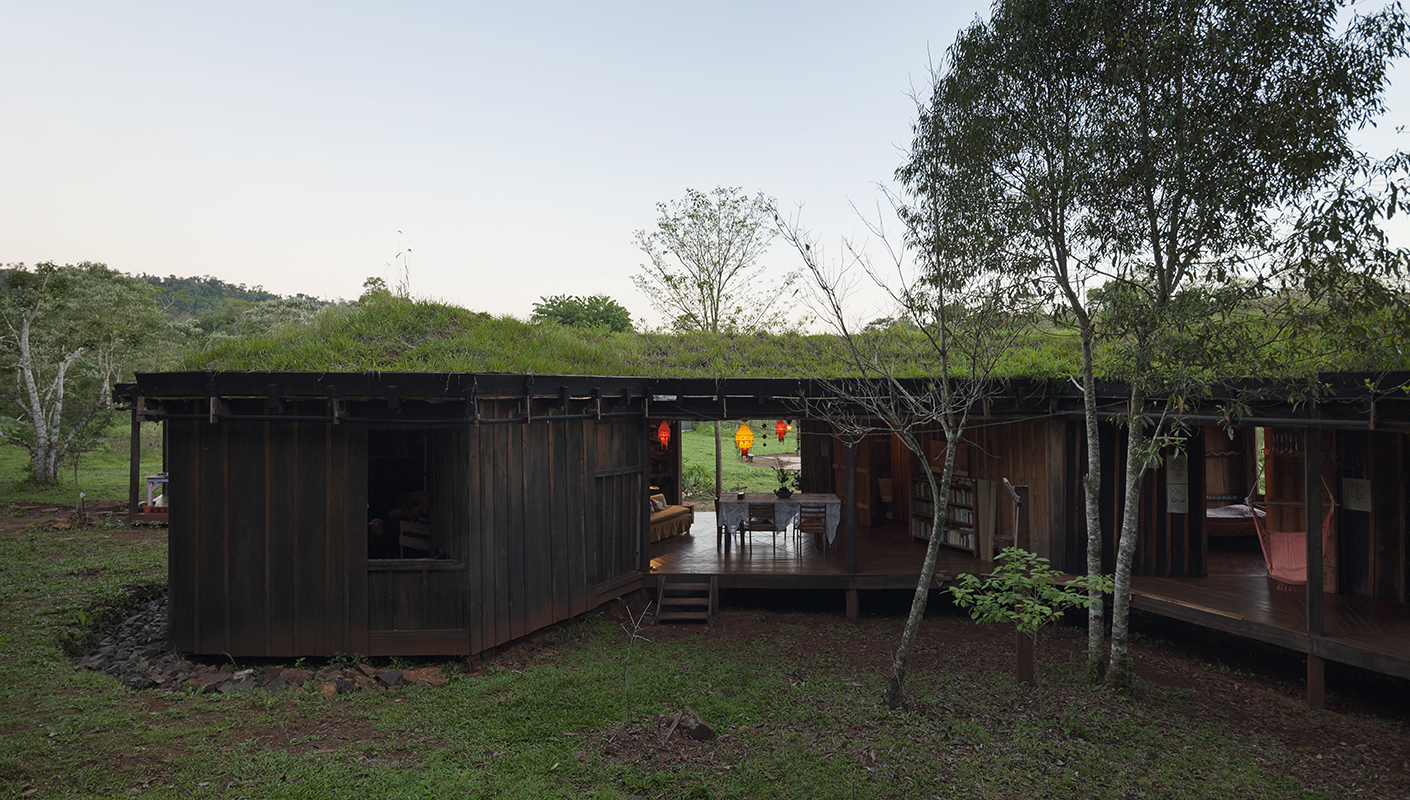 Wooden hostel in the green