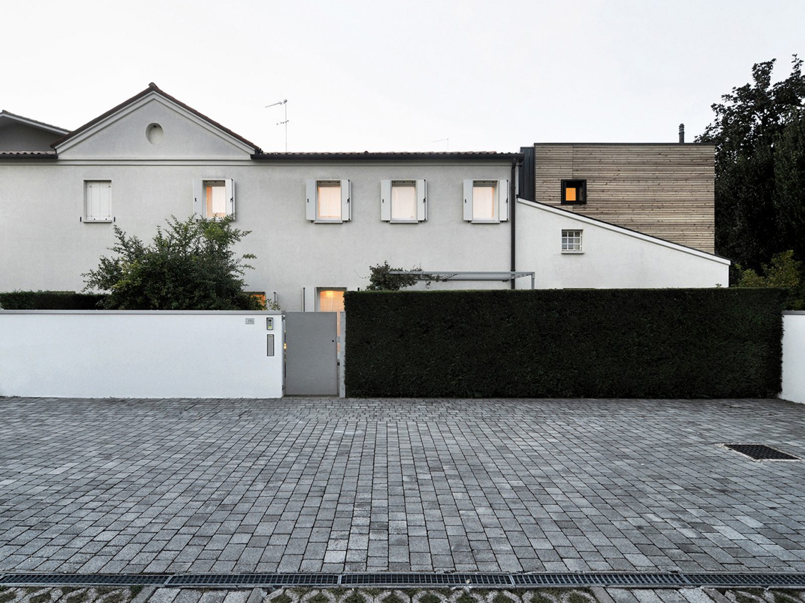 Existing house in white plaster