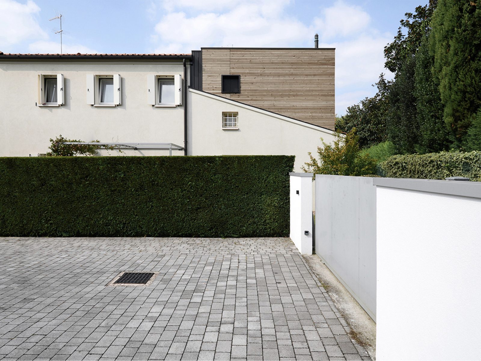 Existing house in white plaster