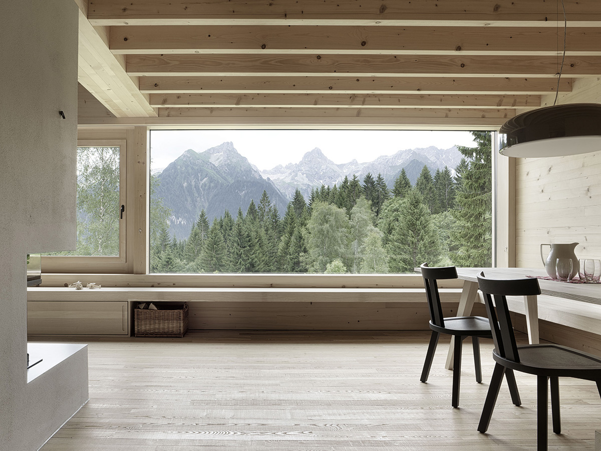 Wooden house with window on the panorama