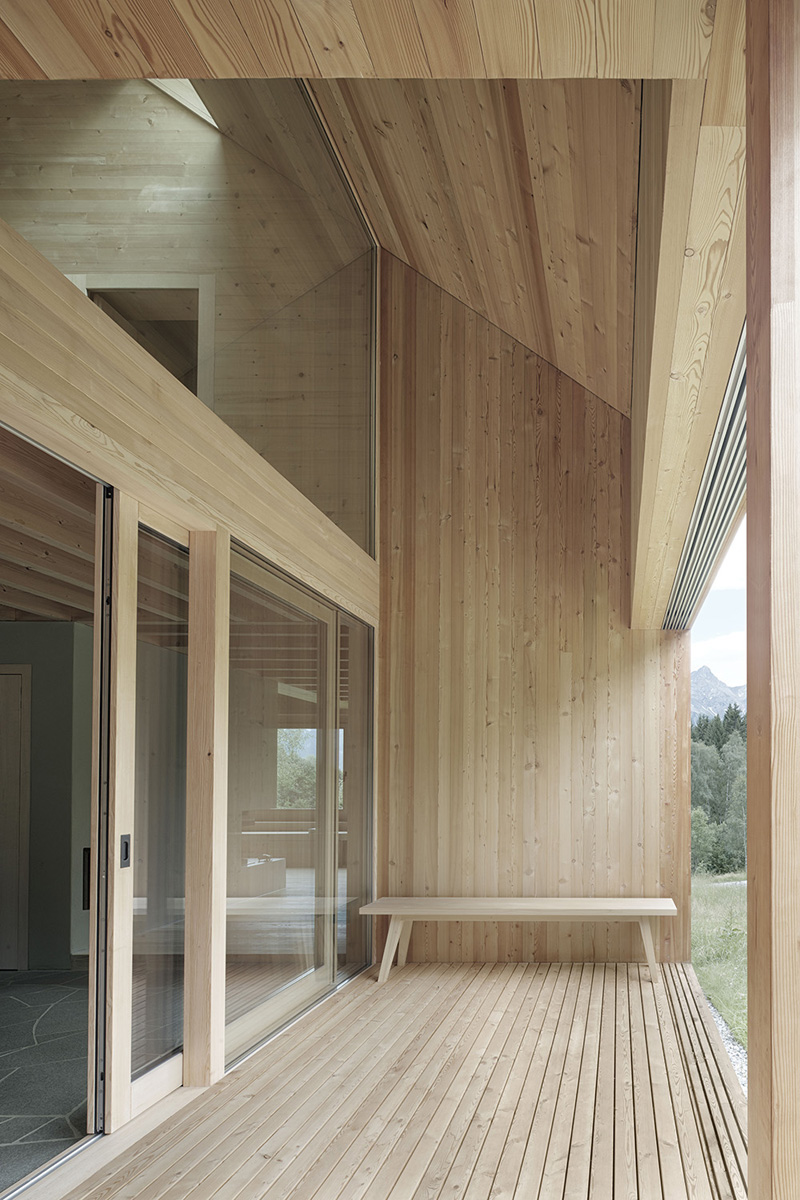 Wooden house with window on the panorama