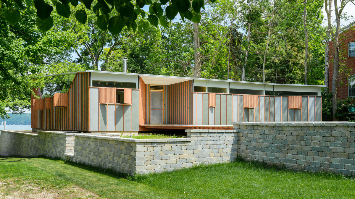 Casa in legno con basamento in pietra