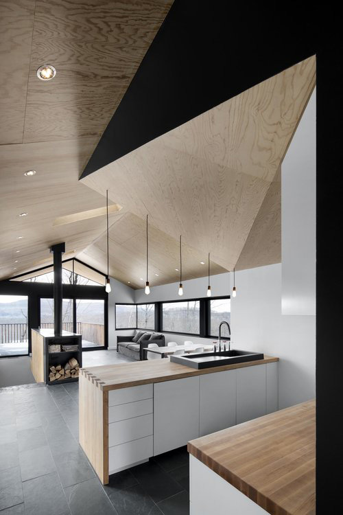 Wooden kitchen with contemporary shapes