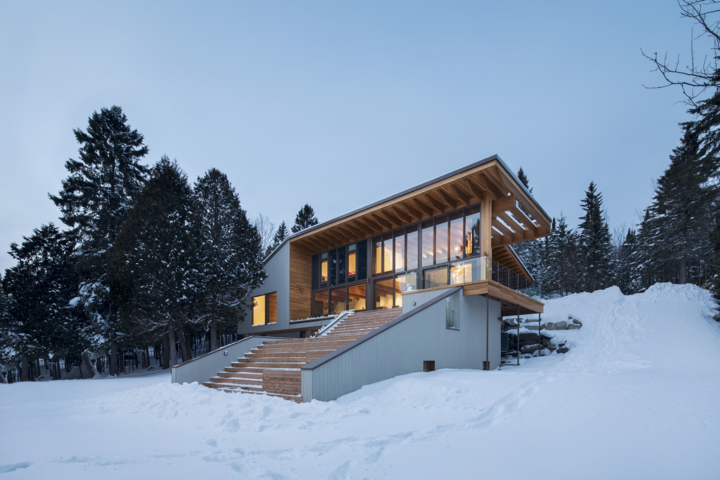 Cabin with bay window open to the lake
