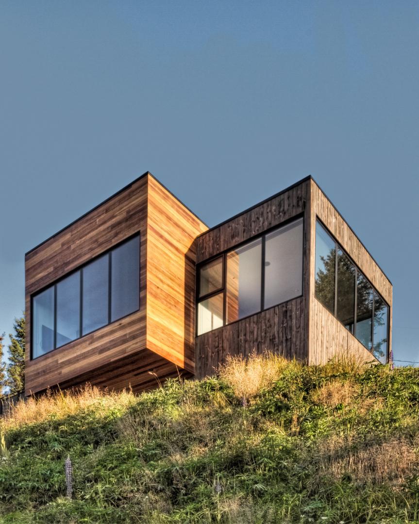 Wooden residences with large windows
