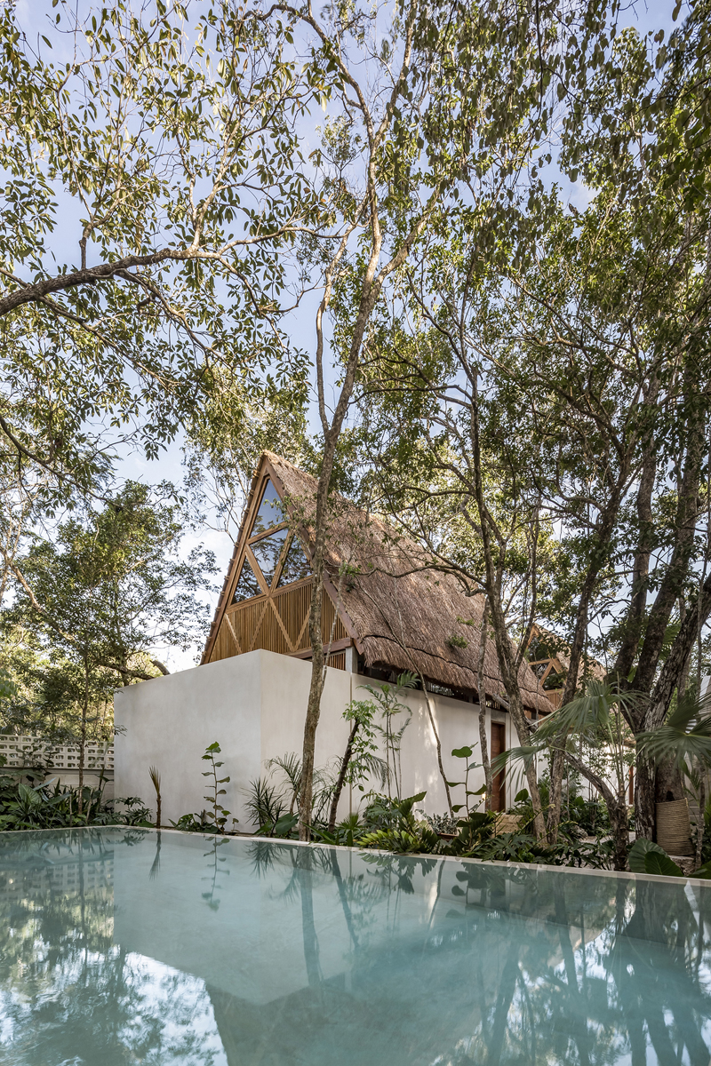 swimming pool and hotel with double pitched roof