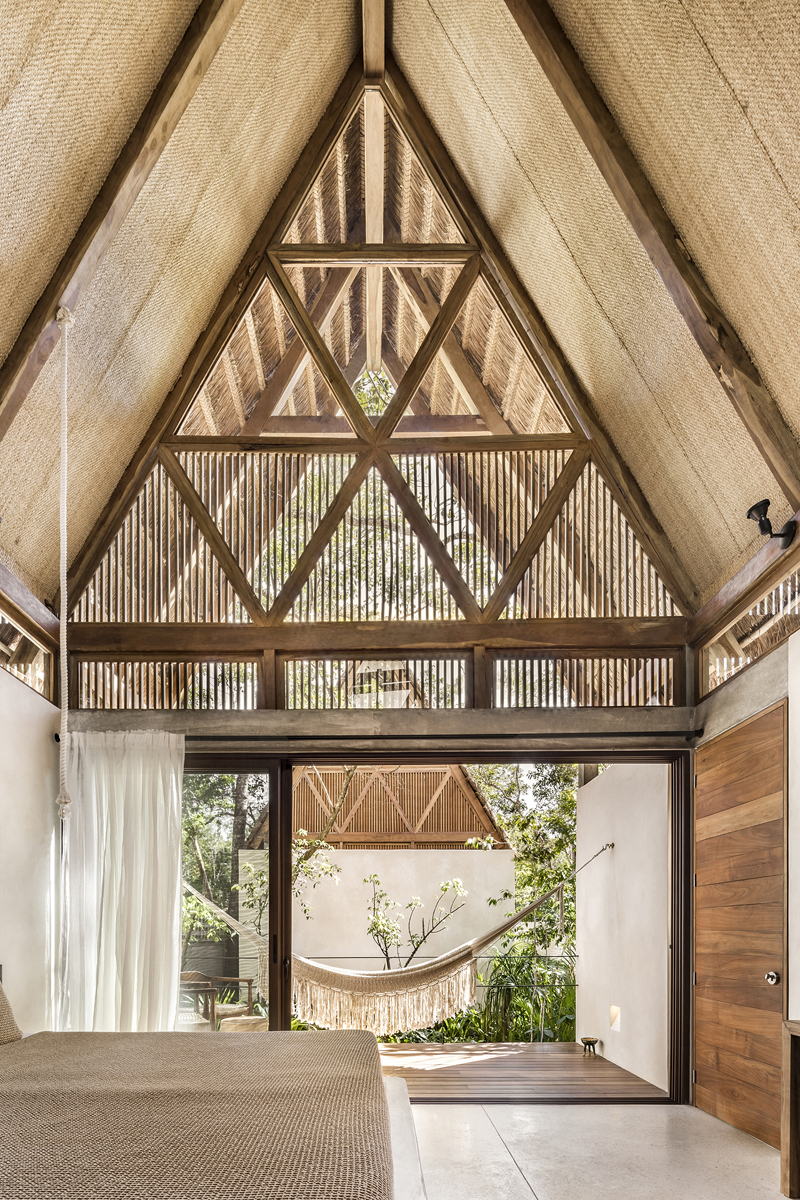 swimming pool and hotel with double pitched roof