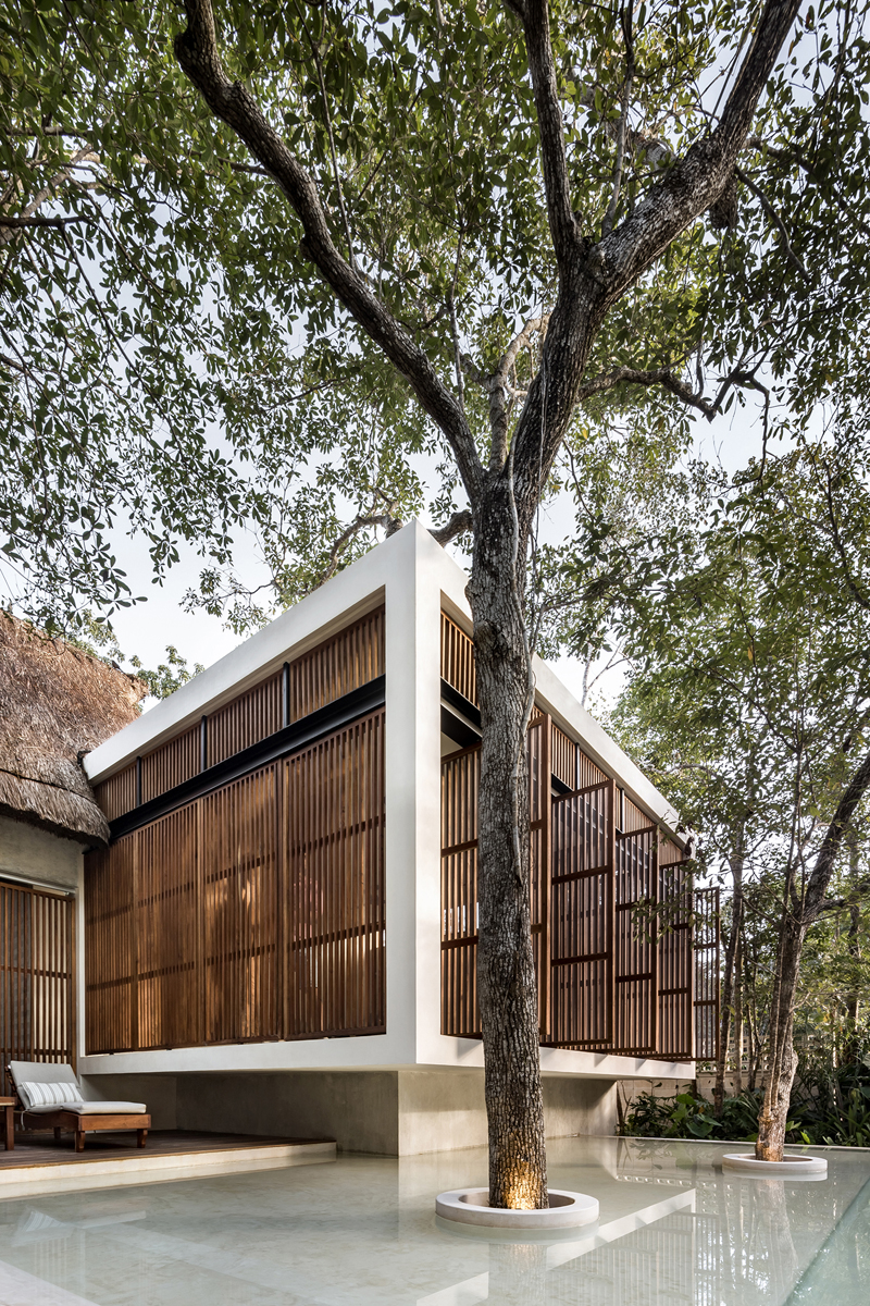 swimming pool and hotel with double pitched roof