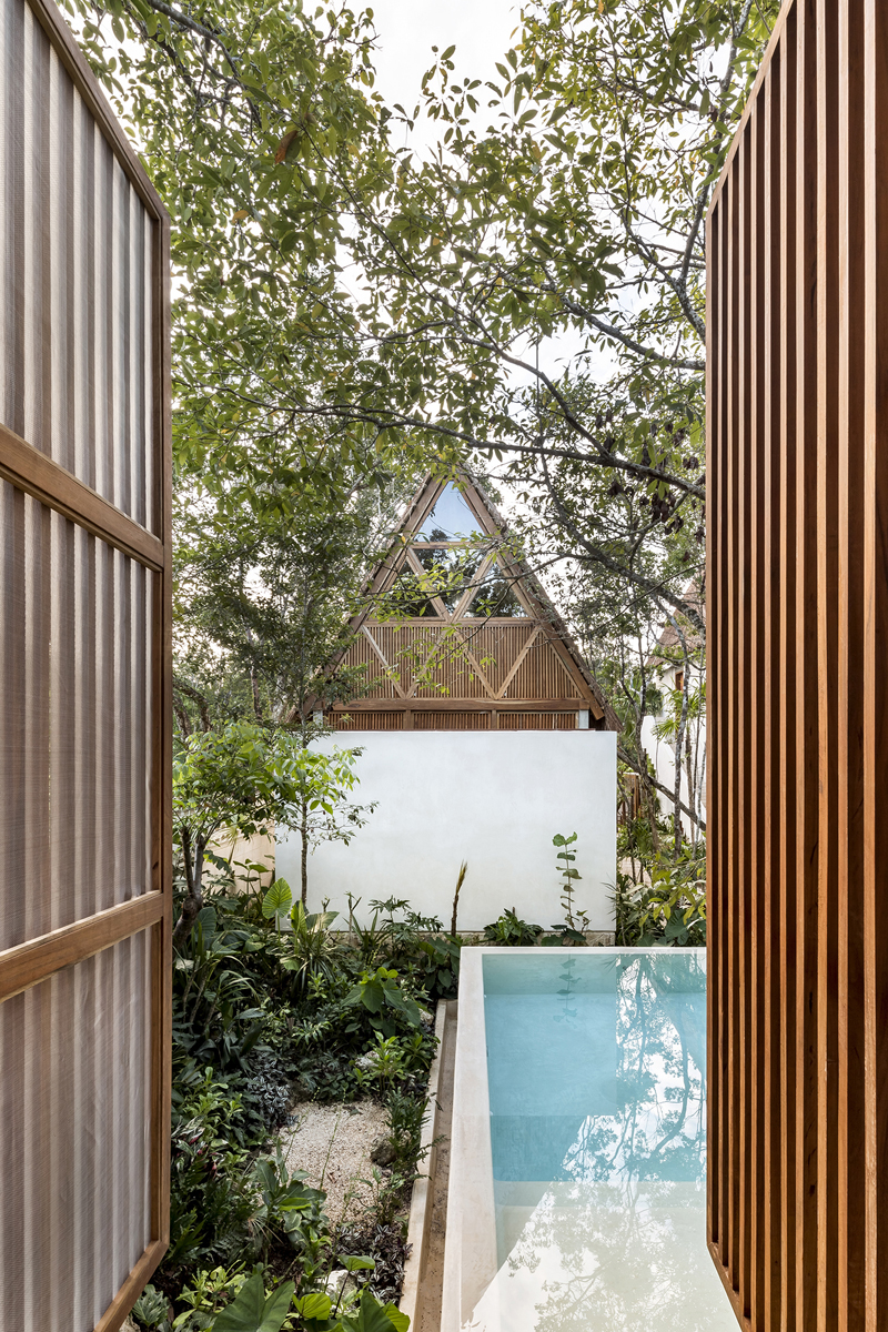 swimming pool and hotel with double pitched roof