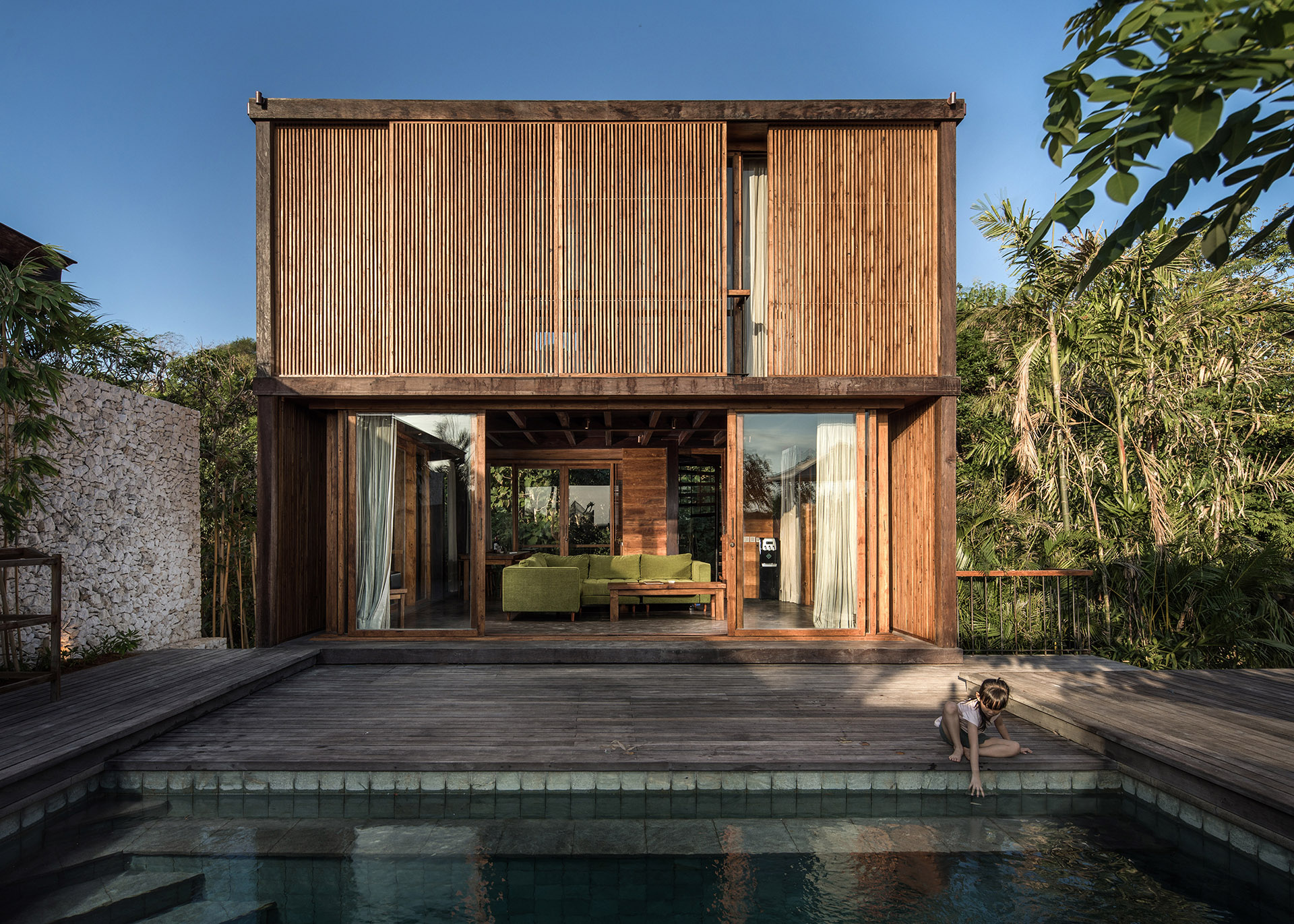 Wooden house with wooden panels