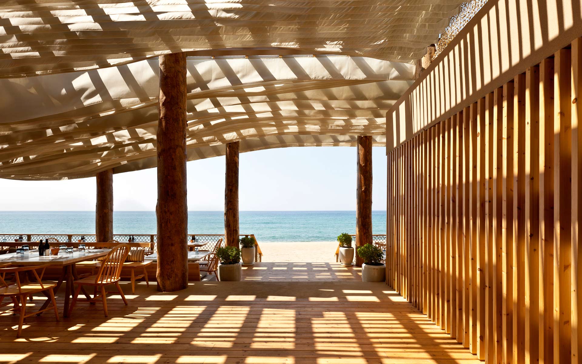 Restaurant with sea view in wood