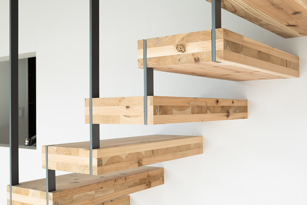 Suspended wooden stairs