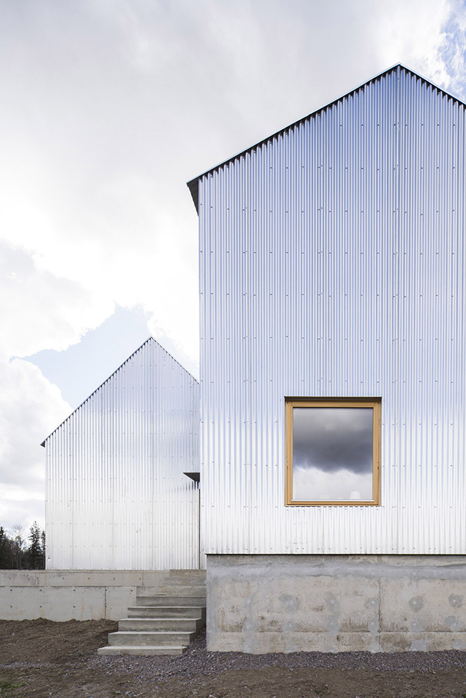 House with corrugated aluminium cladding