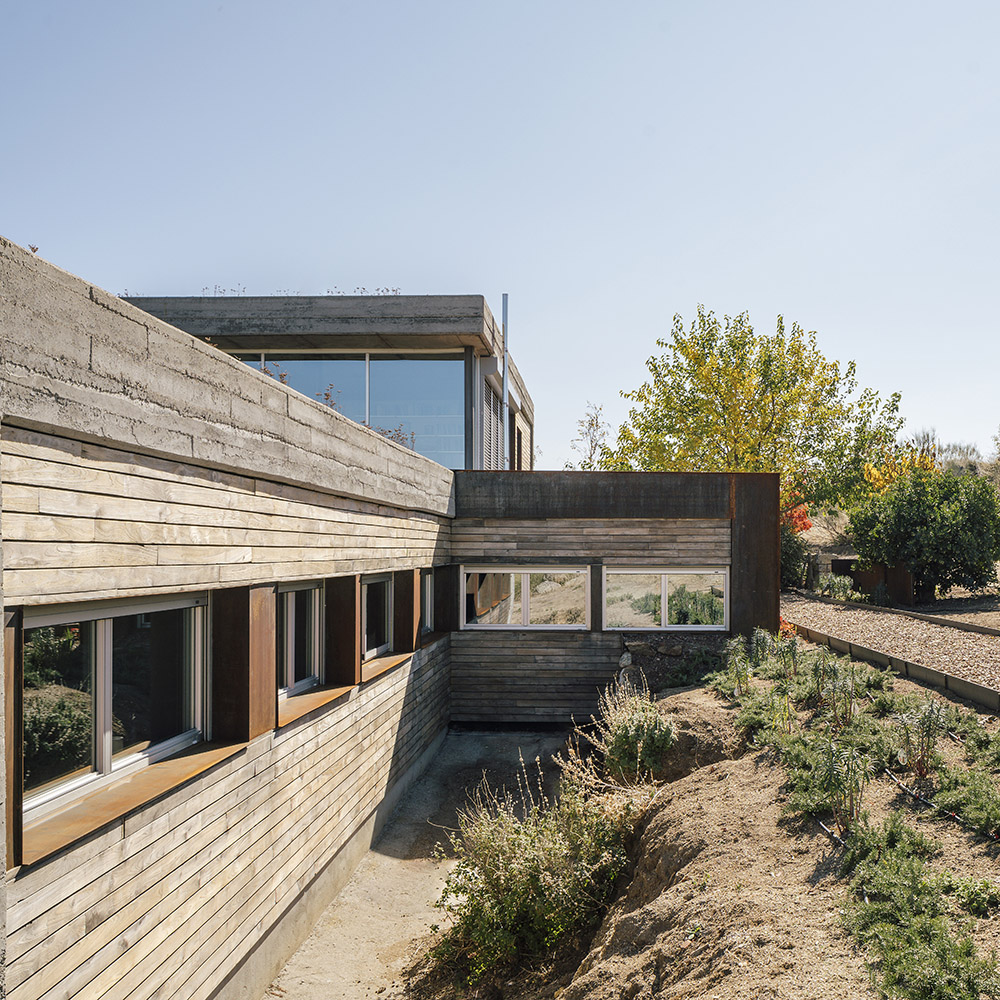 Wooden villa and corten