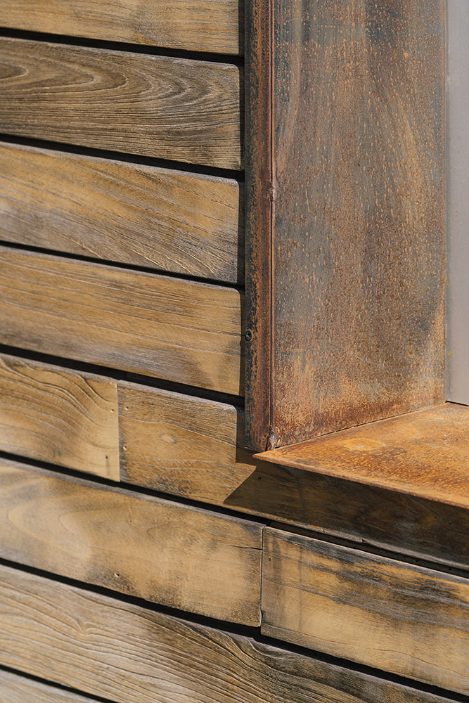 Wooden villa and corten