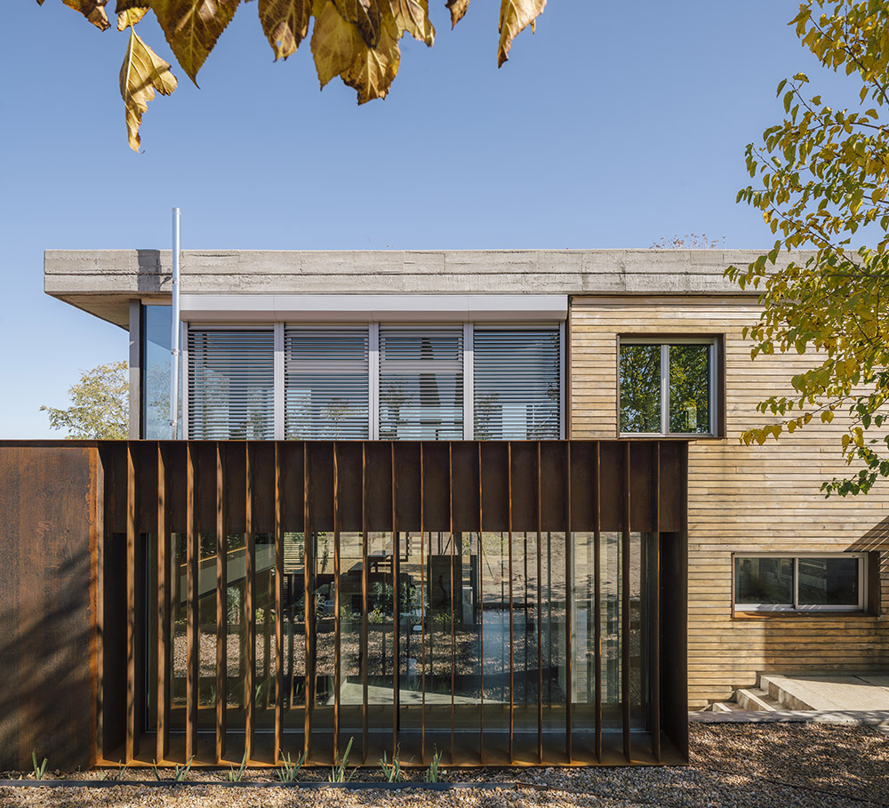 Wooden villa and corten