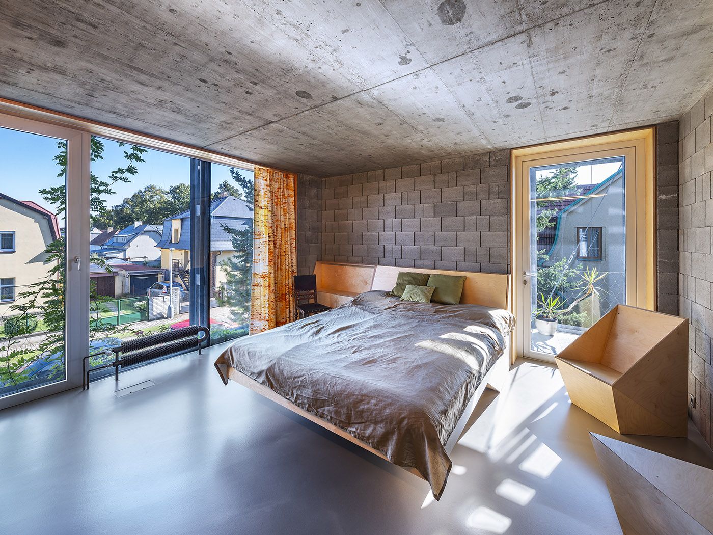 Steel corset wraps around a dwelling. Reinforcing a 1930s building