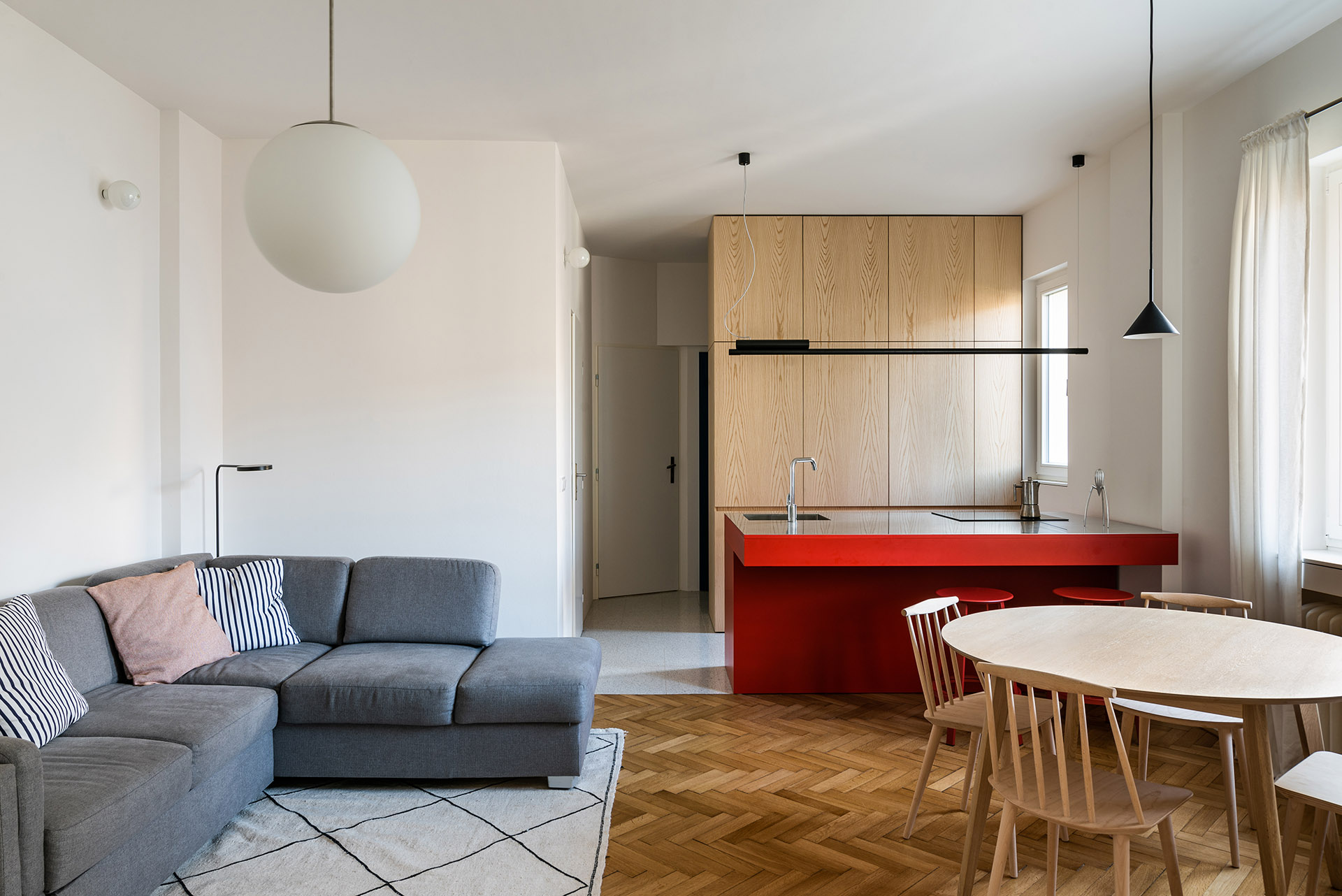 The renovation of the Apartment H in Bratislava's Old Town. A rational layout and a contrast between the white and the primary colors