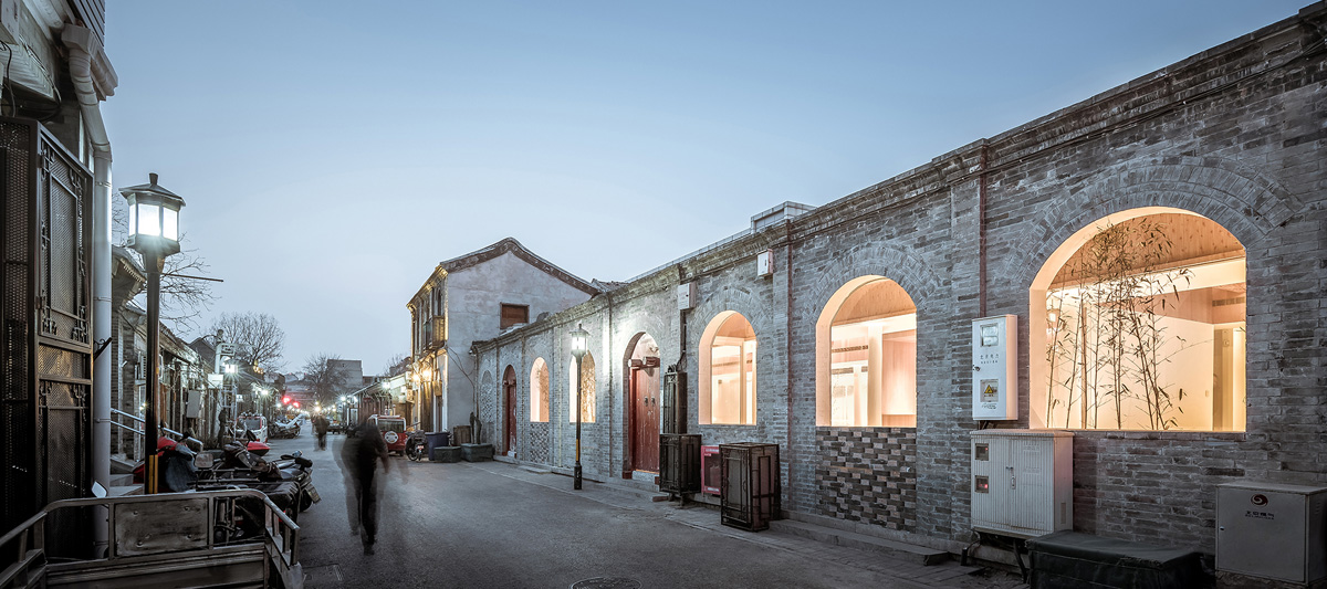 facade with brick and arched windows