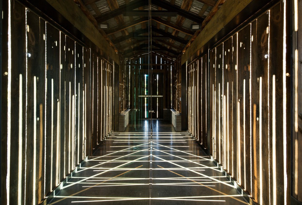 The exterior of the restored wooden barn