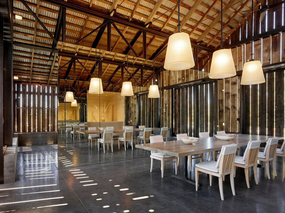 The interior is harmonized with the structure with light wood furnishings