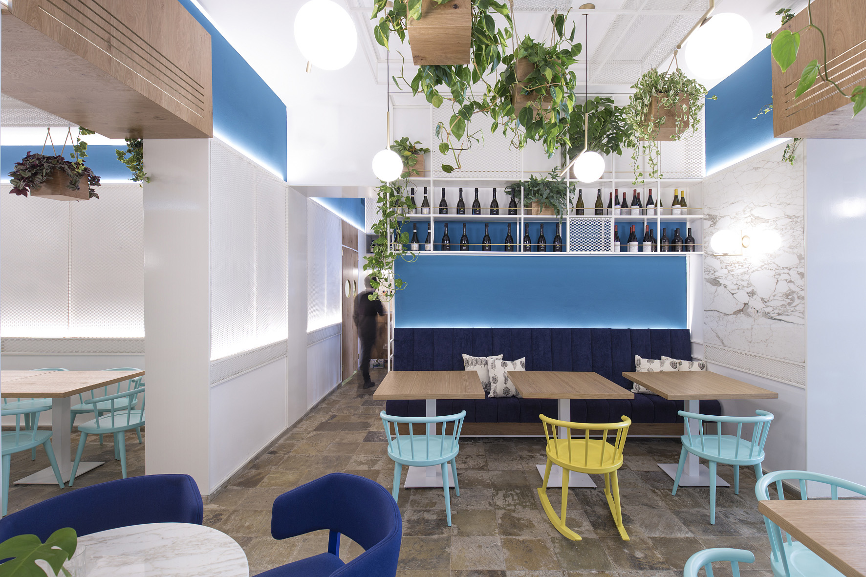 restaurant room with colorful chairs