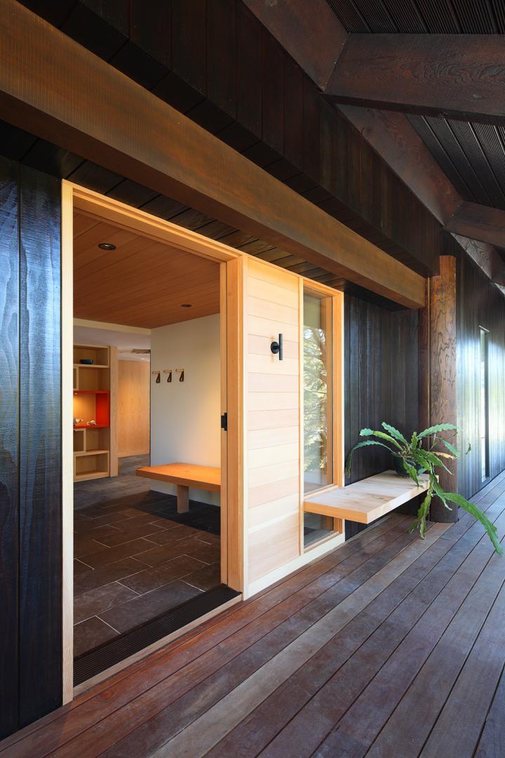 The exterior wooden path overlooking the lake
