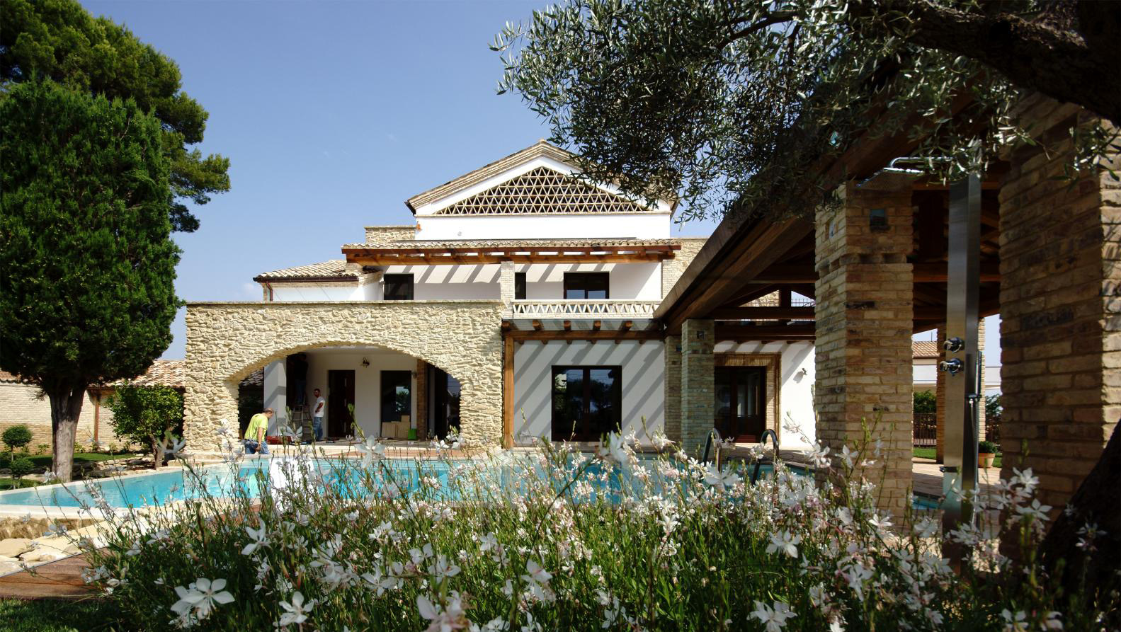 villa with stone swimming pool