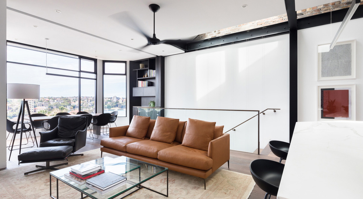 Renovated apartment with dominant glass