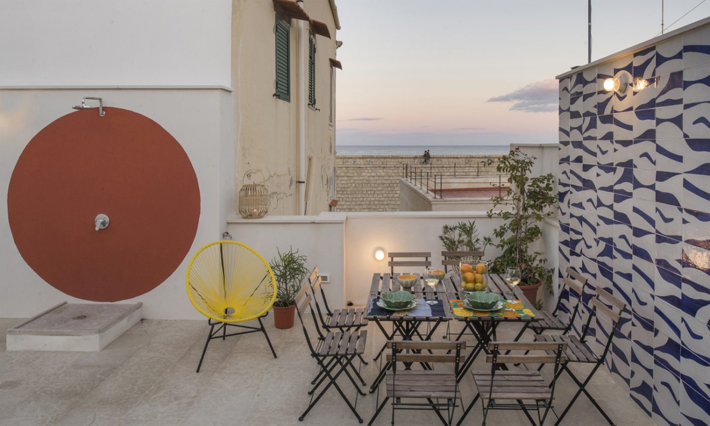 terrace overlooking the sea illuminated in the evening