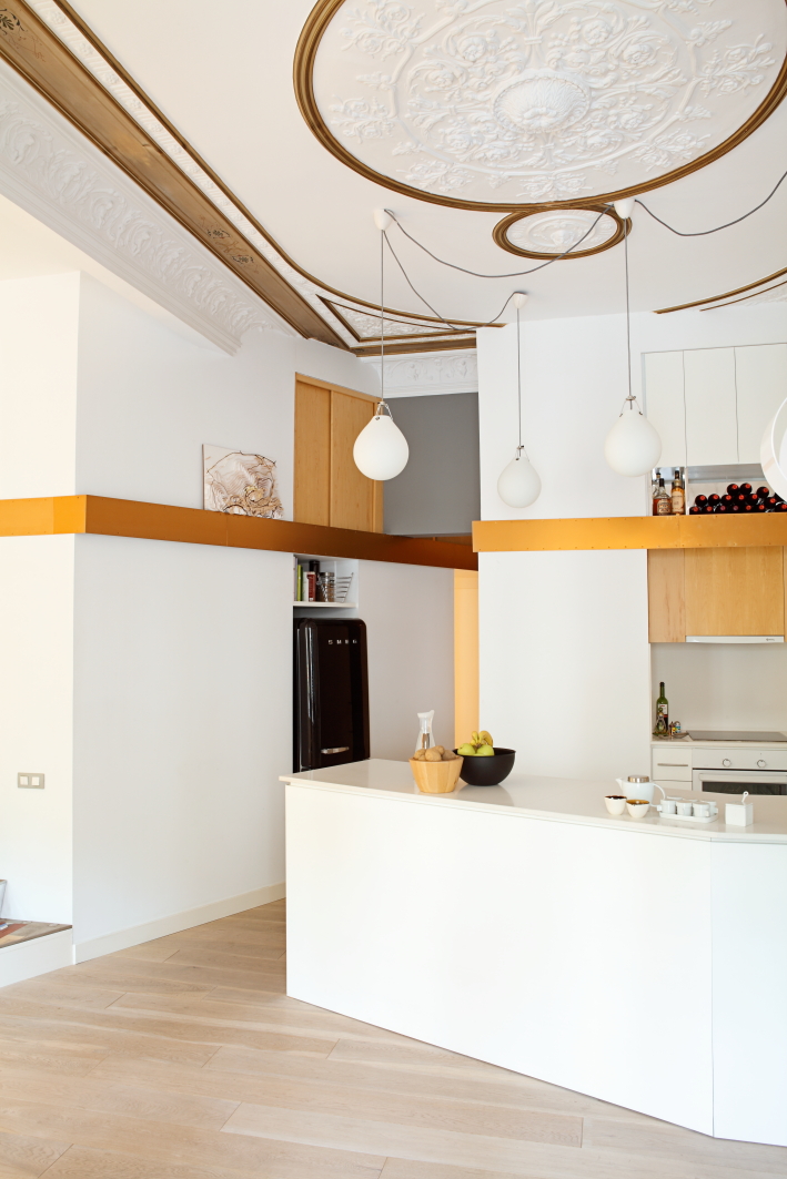 Kitchen and living spaces white and black sofa