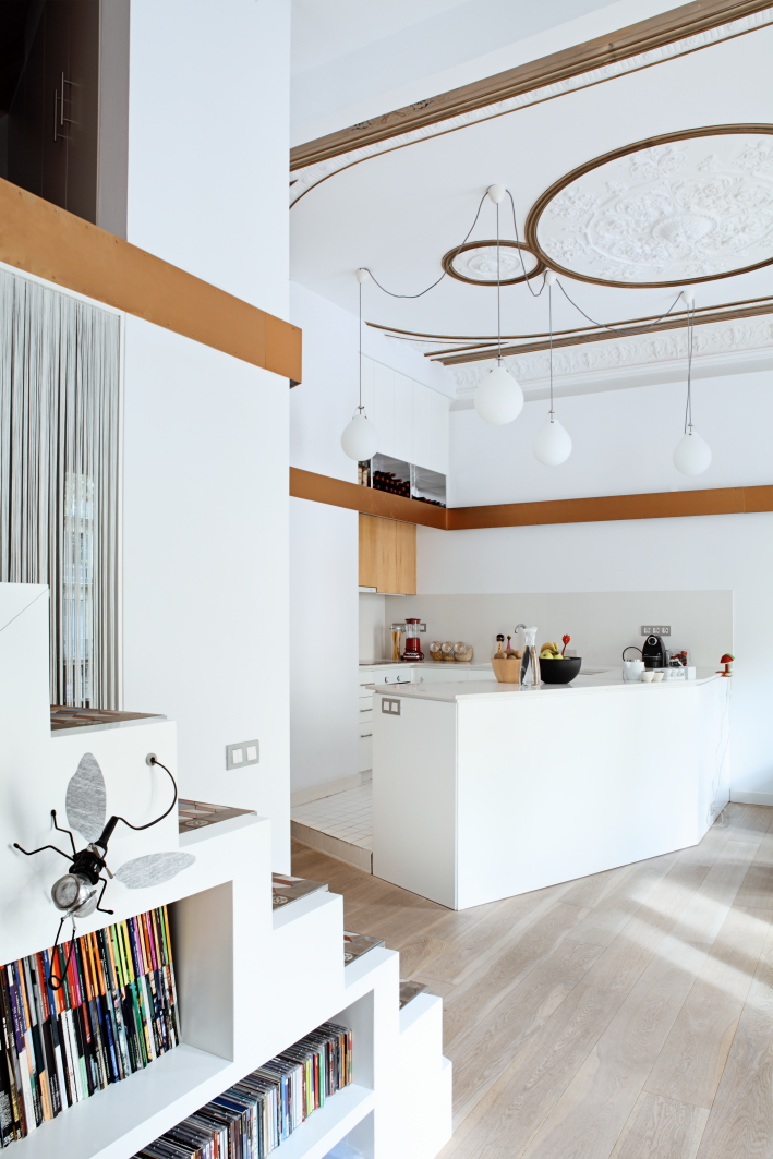 Kitchen and living spaces white and black sofa
