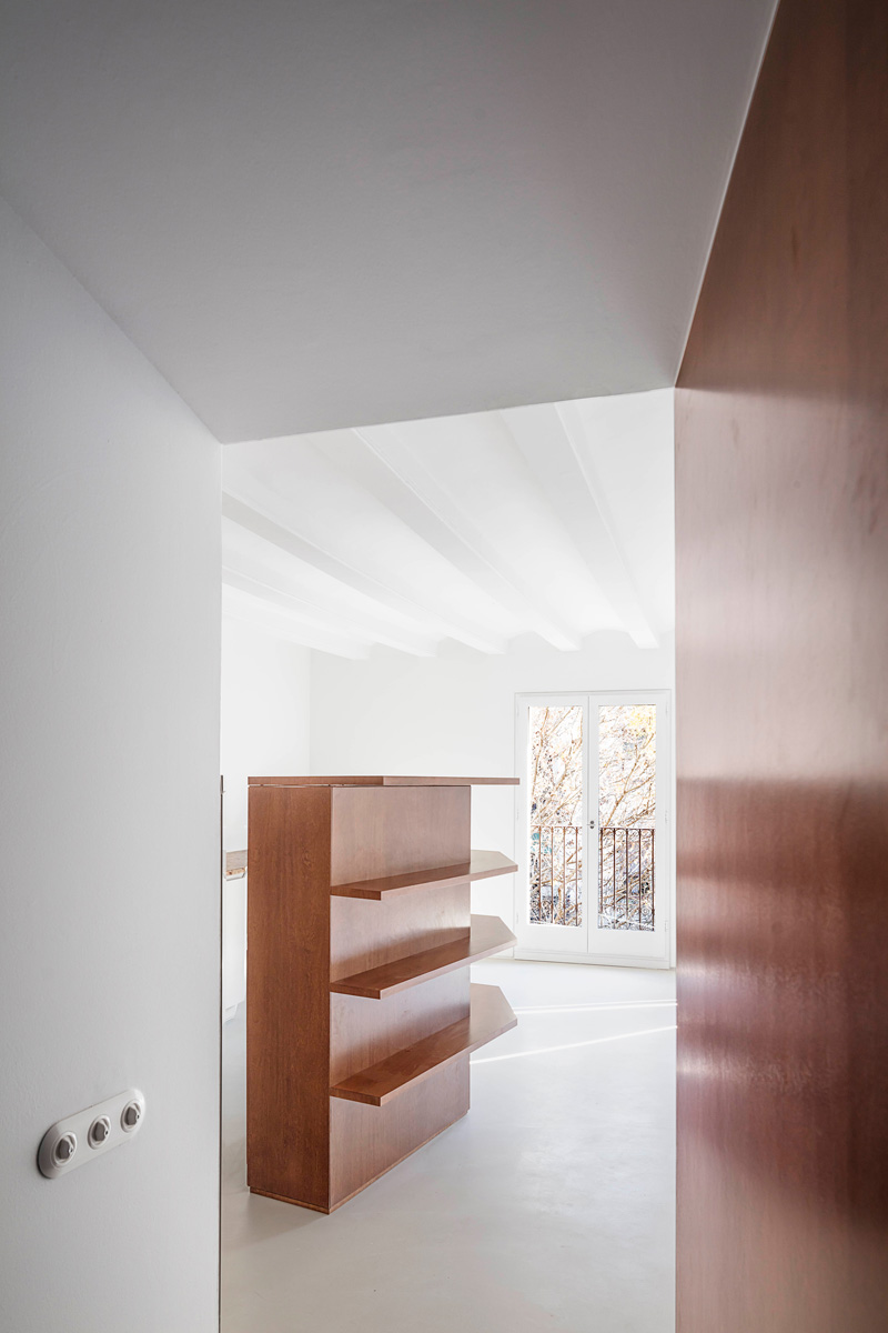 White neutral space with wooden furniture