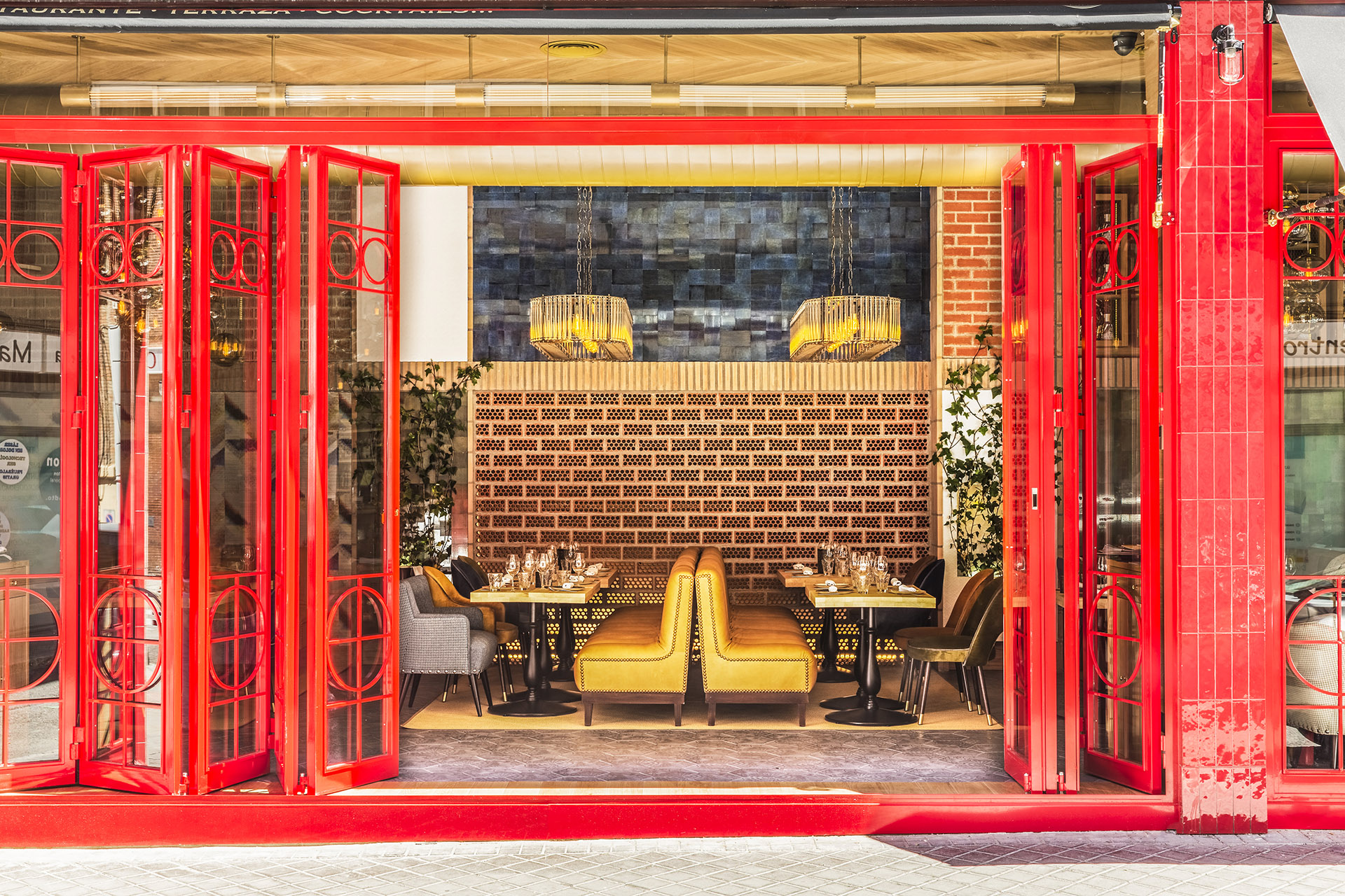 restaurant entrance sliding doors rose iron and glass