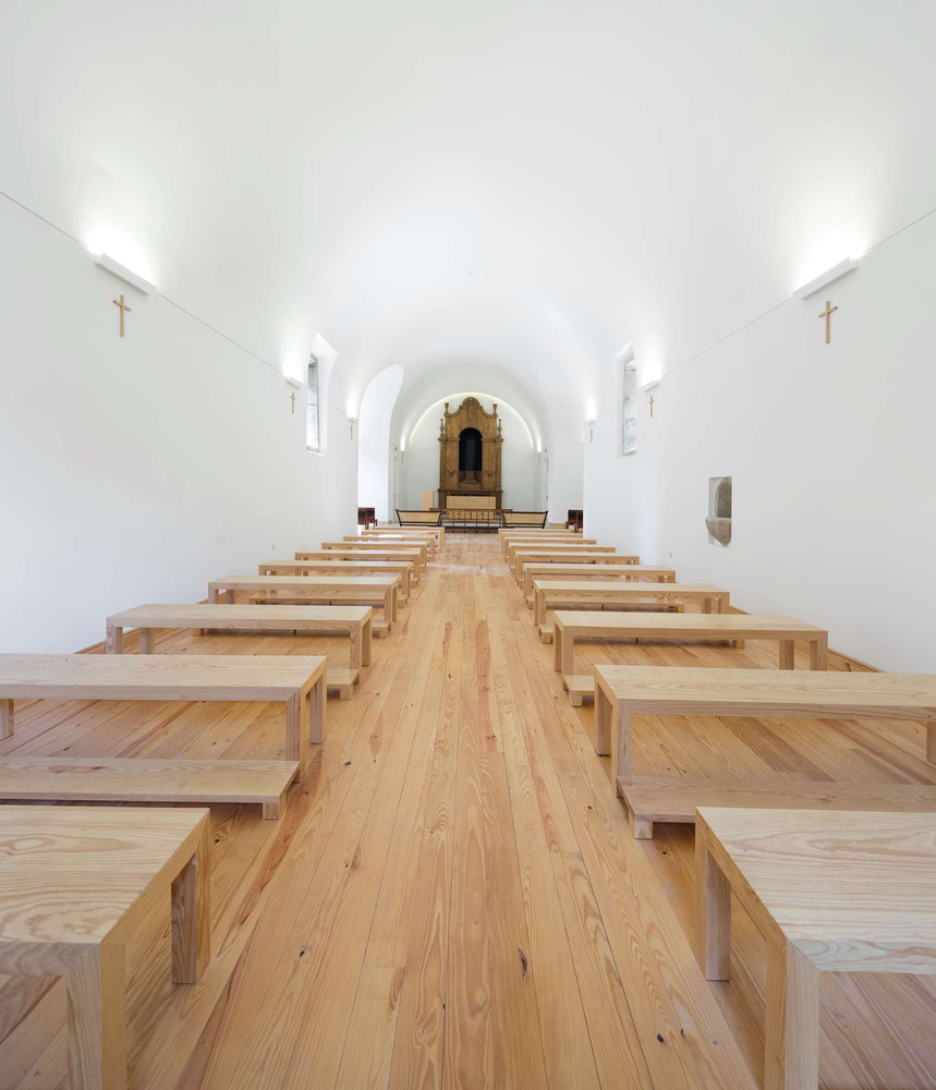 White chapel interior with parquet