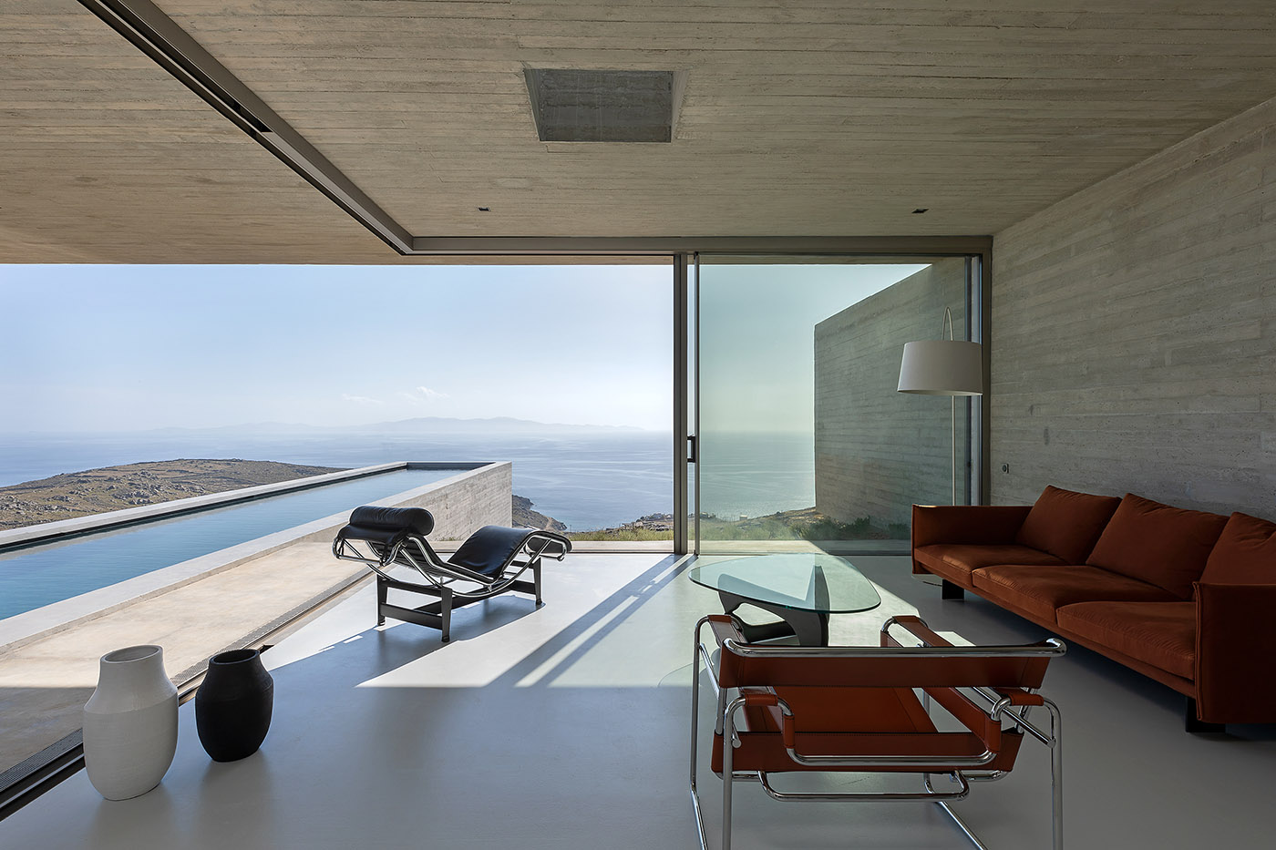 Lap Pool House: an artificial cave carved into the natural landscape of a Greek island
