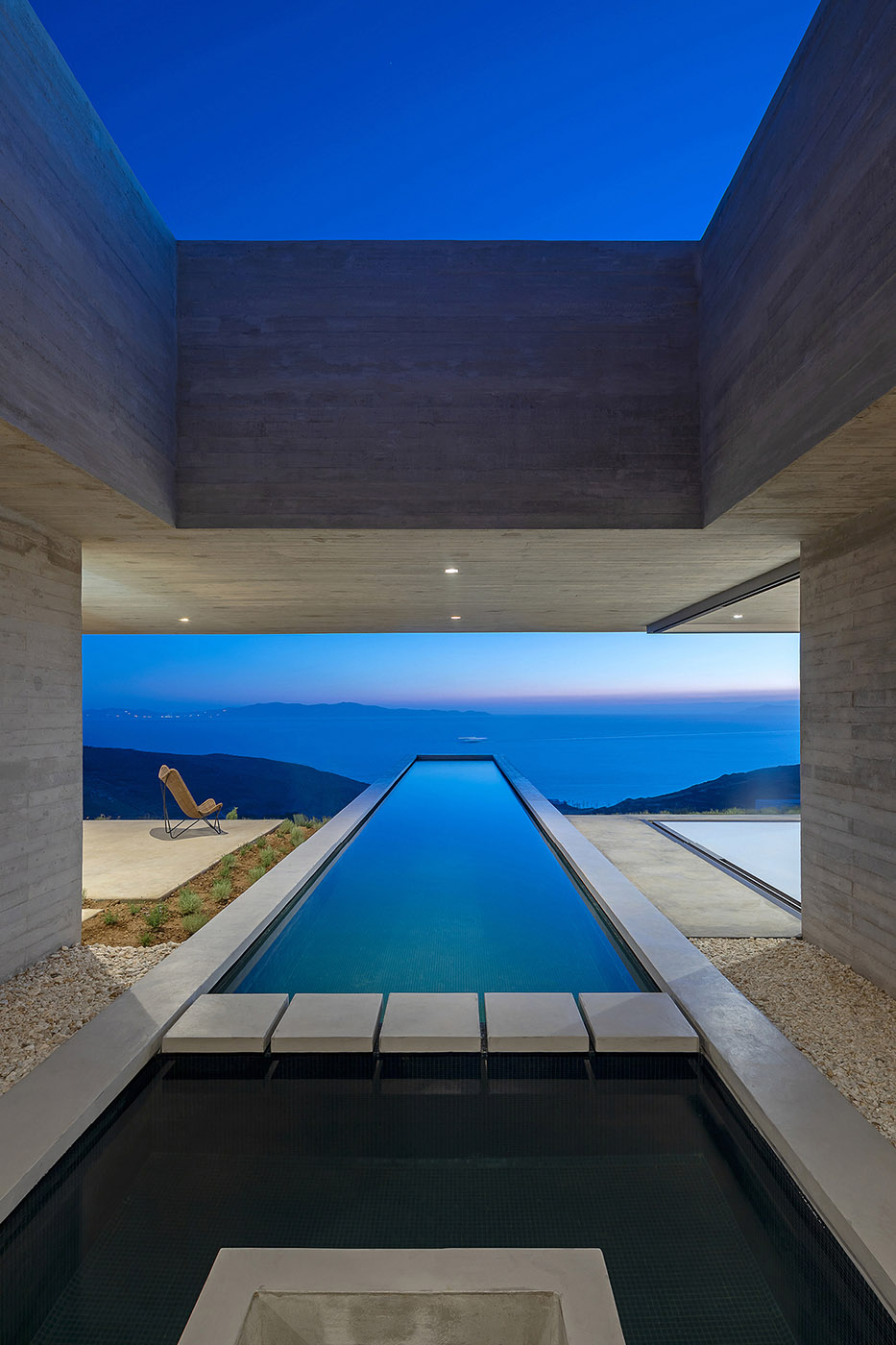 Lap Pool House: an artificial cave carved into the natural landscape of a Greek island