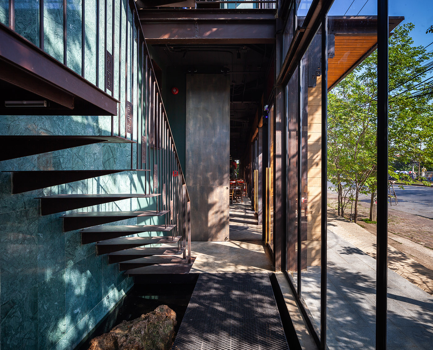 Green and red interiors for the Oui J'aime Hotel, an echo of Chinese tradition