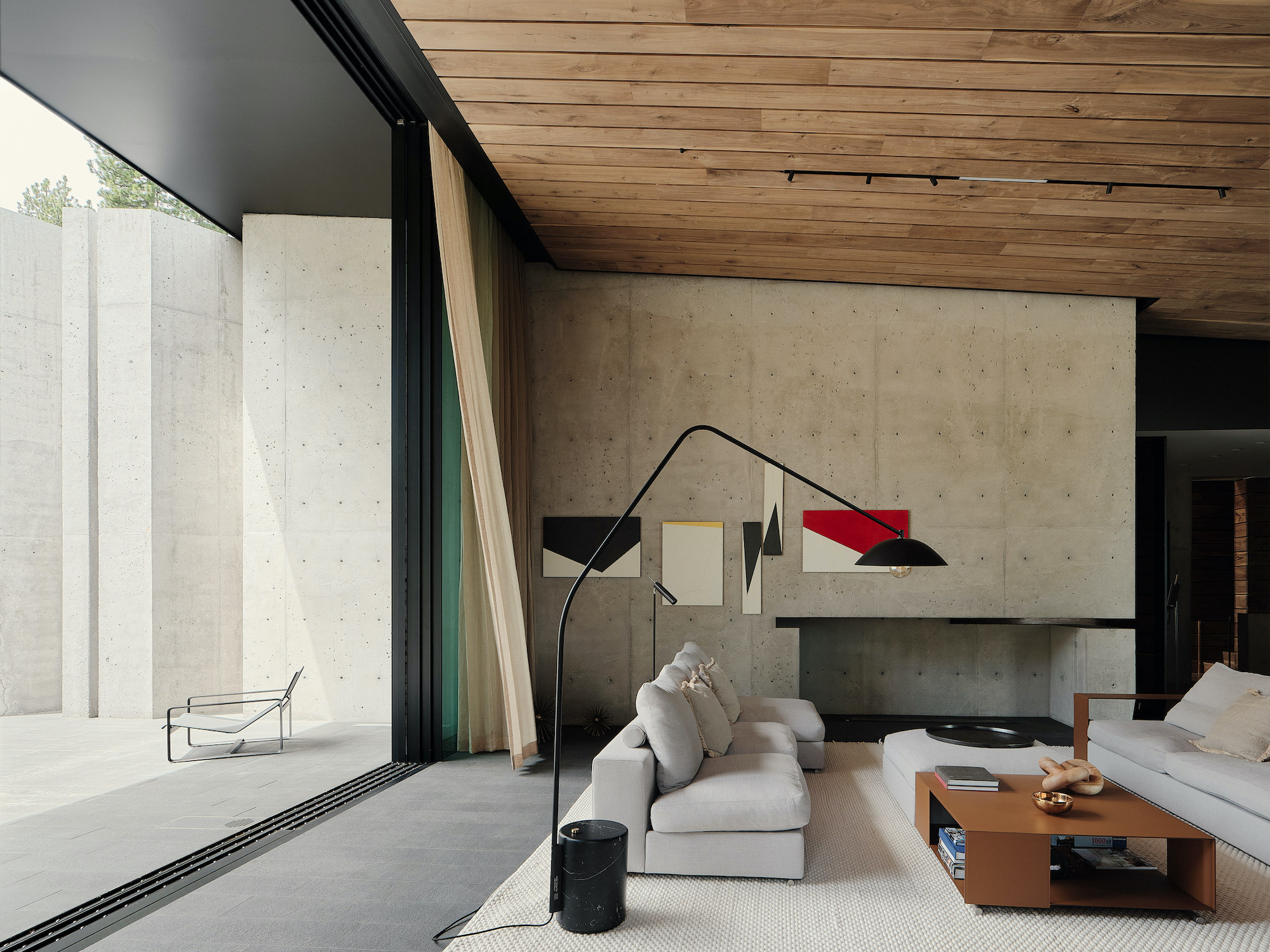 A minimal palette of materials: wood, concrete and steel define the spaces of Lookout House