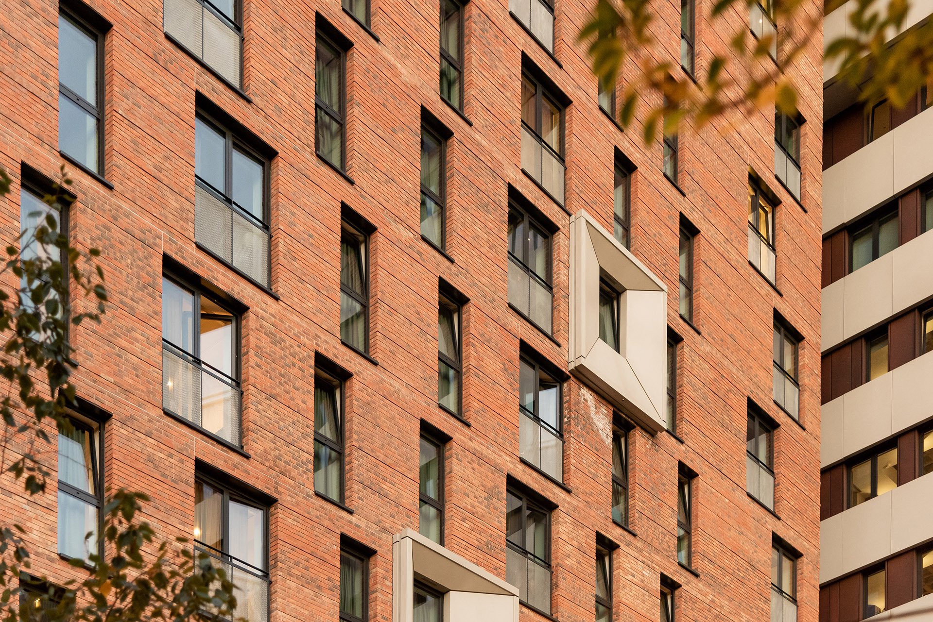 Red bricks and an interplay of openings for the new KAMPUS district