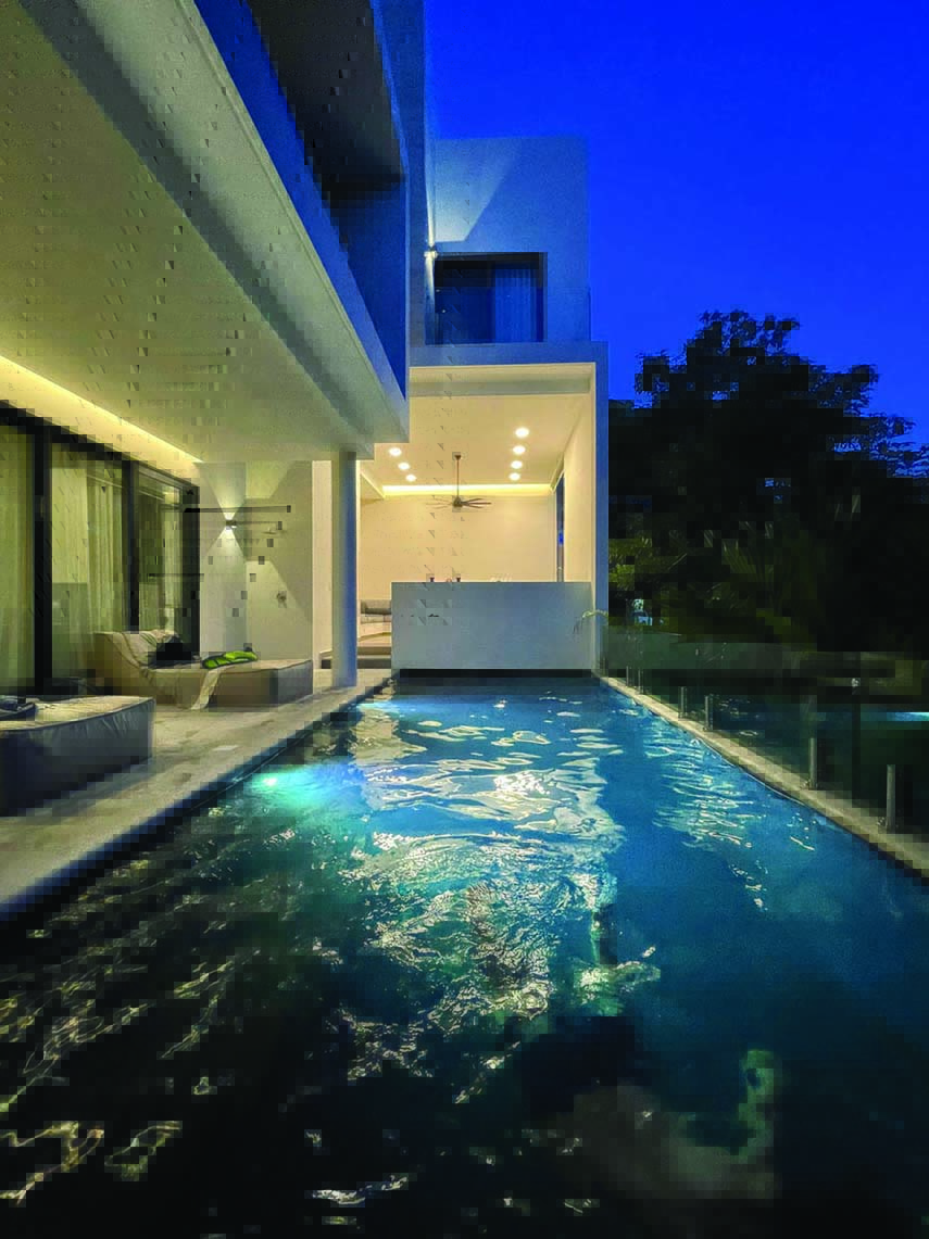 Ampi spazi e atmosfera ammorbidita dai materiali a Casa PC145 nei Caraibi